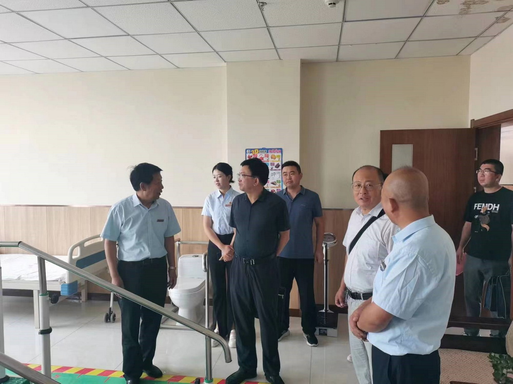 圖3在武威市腦病康復醫院走訪參觀_調整大小.jpg